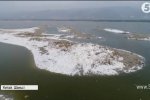 Природні дива: У Китаї посеред літа сніг вкрив ціле озеро