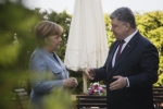 Порошенко і Меркель обговорили її візит в Україну