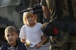 Кулеба: Терористи в ОРДЛО вчать дітей стріляти з окопів