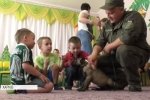 Зоотерапія від Нацгвардії: військові кінологи з чотирилапими завітали до діток з інвалідністю