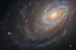 "Безмятежная и спокойная, но с жестокой тайной": NASA показало впечатляющий снимок спиральной галактики