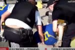 "Збив кепку українським прапором": у Росії чоловіка судять за "напад" на поліцейського