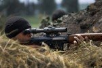 Украинские бойцы показали видео ликвидации снайпера РФ на Донбассе (18+)