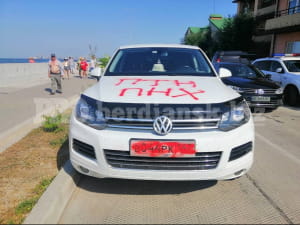 У Бердянську розмалювали російські машини