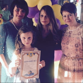 Ольга Фреймут з донькою та родиною