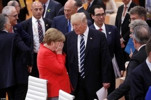 G20: Кого цілувала Меркель – фото