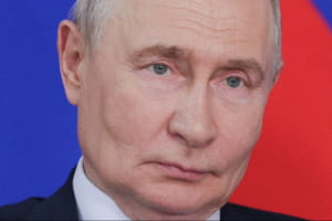 путін