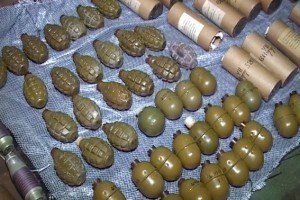 У Києві в гаражі поліція виявила майже 60 гранат та великий арсенал зброї