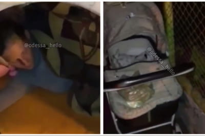 Матір з дитиною сплять на дитячому майданчику