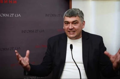 Роман Соха