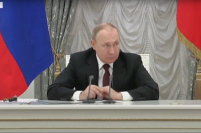Путін