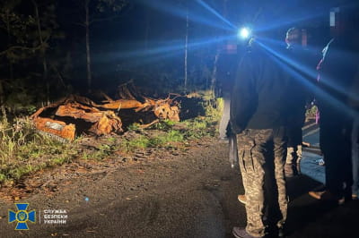 Эксгумация погибшего от рук российских оккупантов