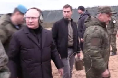 Путін і людина із валізкою