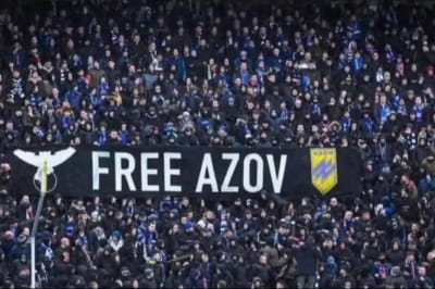 Вболівальники та банер