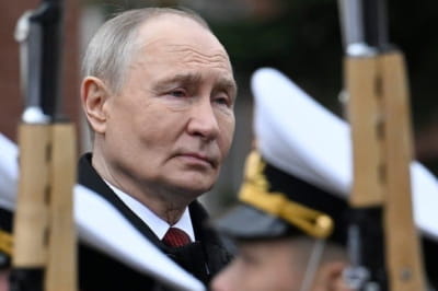 путін