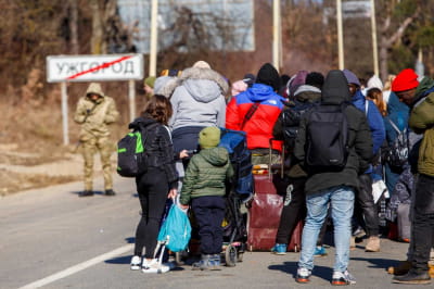 Біженці з України