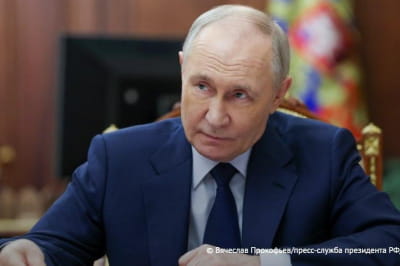 путін