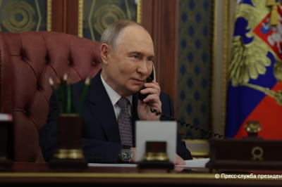 путін