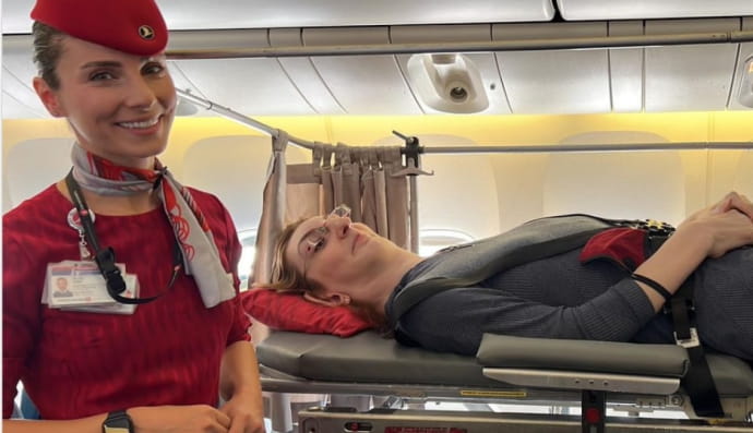 найвища жінка у світі вперше мандрувала літаком