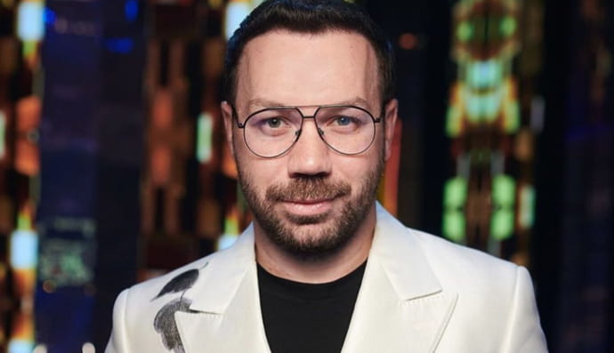 дизайнер Андре Тан