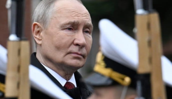 путін